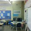 A teacher at Leeds Elementary School,  uses the room's Q-Tec to display papers. 